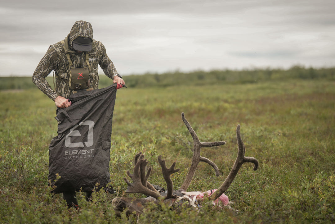 man filling meat bag