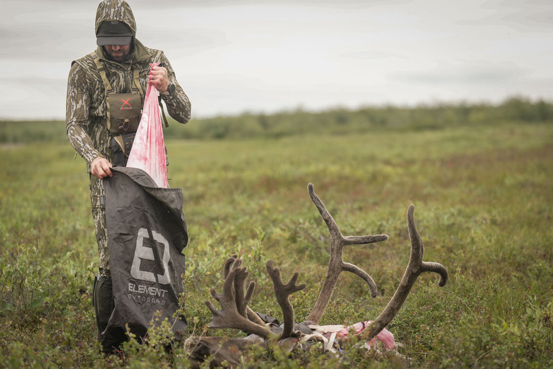 man filling meat bag