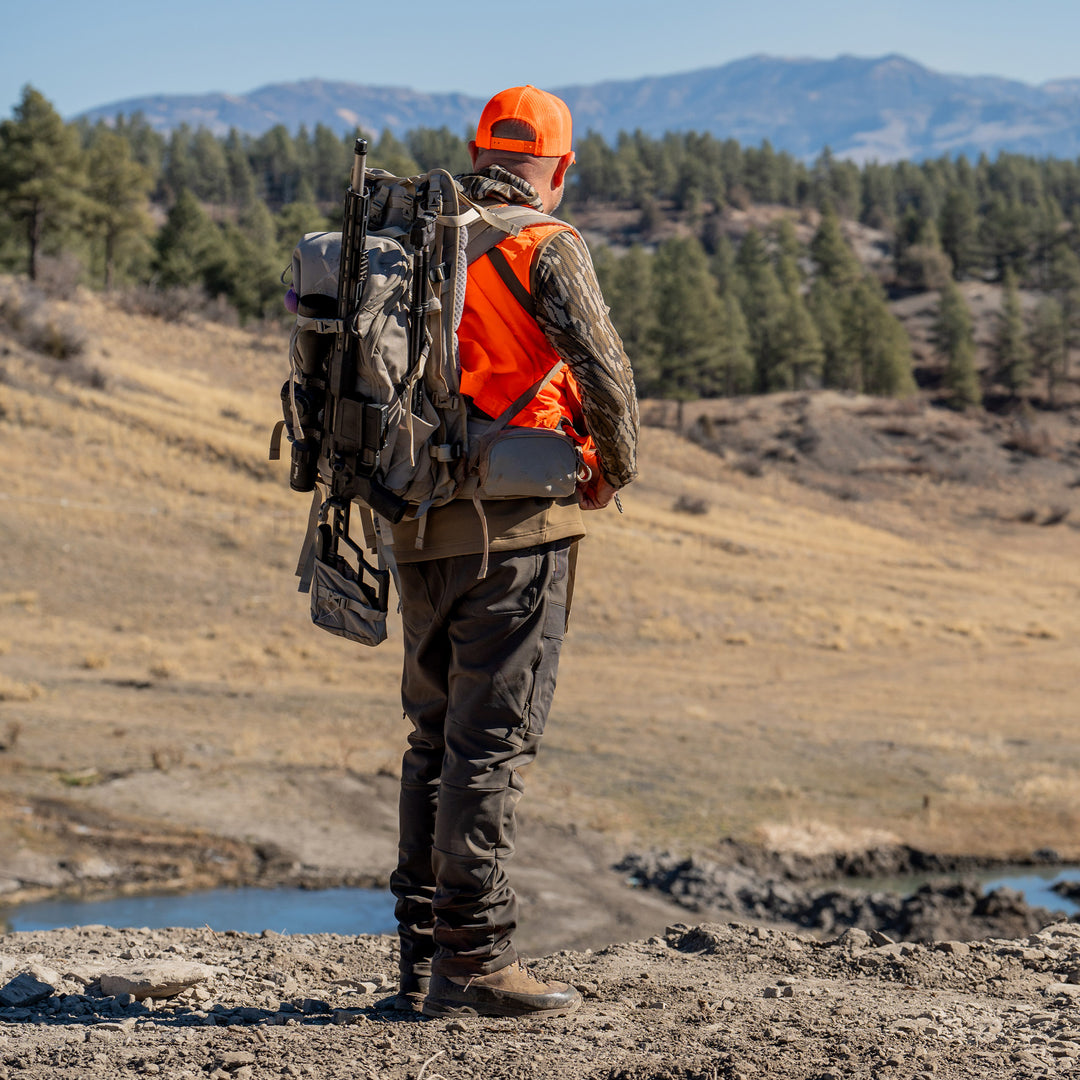 Man on a Hunt in Montana wearing Peak Pants#color_original-bottomland